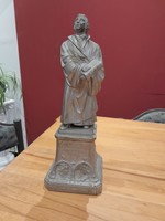 Tin statue