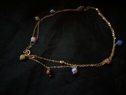 Gold necklace with Murano balls. New