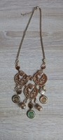 Gold colored long Indian style necklace