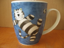 Striped kitten, cat playing football - domestic mug