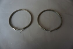 Hoop earrings made of thin alloyed stainless steel wires are for sale.