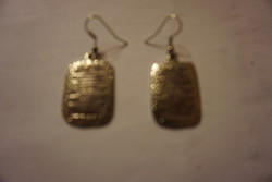 Cast brass golden yellow decorative dangling earrings for sale.