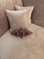 Anti-gilded garnet brooch