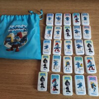 25 dominoes in a collection bag