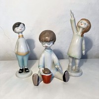 Ravenclaw porcelain figurines - Aurél Káldor - little girl making sand - pot-bellied boy - waving little girl