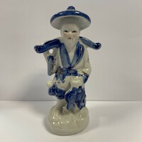 Old fisherman porcelain statue