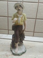 Romanian porcelain statue for sale! Man catching fish, hand-painted porcelain sculpture