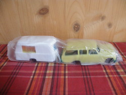 Retro plastic small car with trailer from the 1980s, unopened, with manufacturer's information label