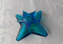Vintage perfume in a blue star-shaped bottle