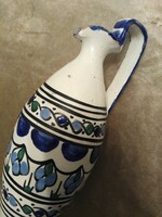 Ceramic jug with a handle