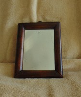 Antique small wall mirror with walnut frame