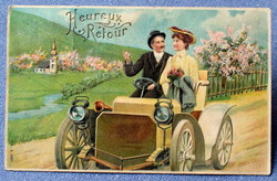 Antique embossed greeting litho postcard lady and gentleman on automobile