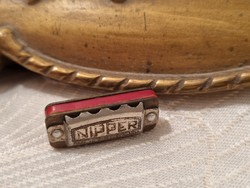 Rare nipper mini harmonica
