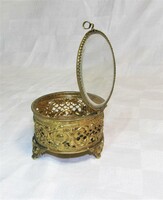 Antique openwork copper jewelry holder with glass lid.