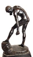 Bronze statue on a marble pedestal