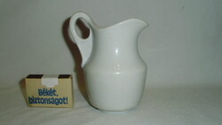 Antique, thick-walled porcelain milk spout, small jug