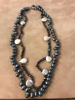A particularly beautiful, extravagant, real string of pearls. Made from cultured pearls. Custom made! New!.