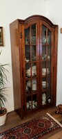 A large, partially solid wood display case, cabinet