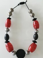 Fashionable necklace made of ceramic, metal and red plastic eyes, 46 cm long