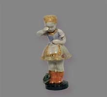 A ceramic crying little girl with a broken jug, would it be an early Eschenbach?