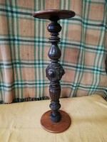 Nicely shaped wooden pedestal