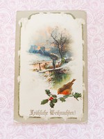 Old postcard postcard snowy landscape with little bird