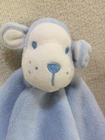 Light blue plush toy (teddy bear, monkey, dog?)
