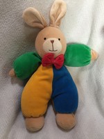 A large, rattling Benetton-colored bunny figurine