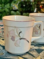 Old unmarked mug with purple flowers