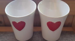 Ceramic cup with heart disc