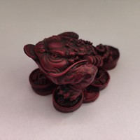 Feng shui money frog on coins