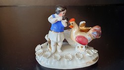 Antique mini German porcelain little girl with cock. Injured. 6 cm high.