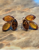 Silver earrings marked with honey-lemon-moss amber stones