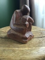 Old carved wooden statue