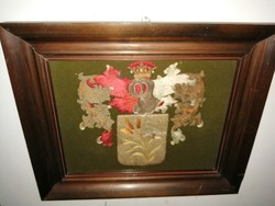 Antique woven coat of arms unknown to me, silk needle tapestry? Beautiful, in its original frame.