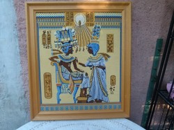 Tapestry depicting Egyptian figures in a solid wood frame