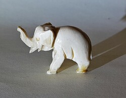 Tiny carved bone elephant