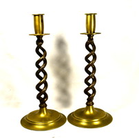 Spectacular and specific gravity solid bronze and copper candle holder pair with twisted body