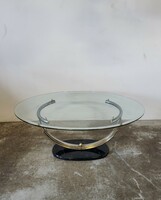 Coffee table on a marble base, with an art deco feel, cradle shape