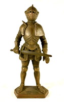 XIX. Sz ends with a French sign: medieval armored knight