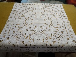 Dreamy snow-white embroidered openwork tablecloth.