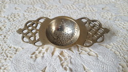 Old, beautiful pierced silver-plated tea strainer