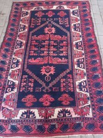Hand-knotted antique nomadic carpet