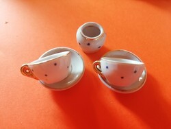 Baby porcelain with blue dots for a doll house. 59.