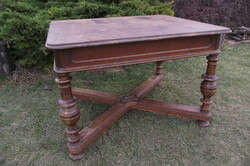 Antique robustly built dining table.