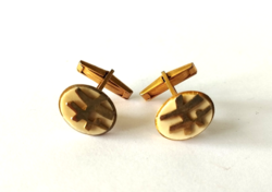 A pair of beautiful old gold-plated metal cufflinks with oriental writing