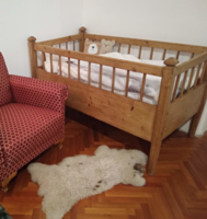 100-year-old antique hardwood children's bed