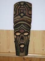 An interesting mask carved from a single tree trunk for ritual events of a native tribe!