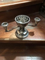 A metal candle holder, 24 x 17 cm in size, interesting.