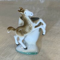 Antique porcelain vase with horse